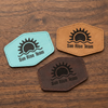three custom leather patches