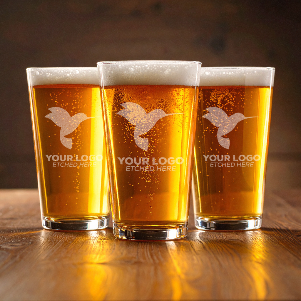 Set of three engraved 16oz pint glasses with etched logos—perfect for bulk corporate orders, onboarding kits, or branded hospitality merchandise.