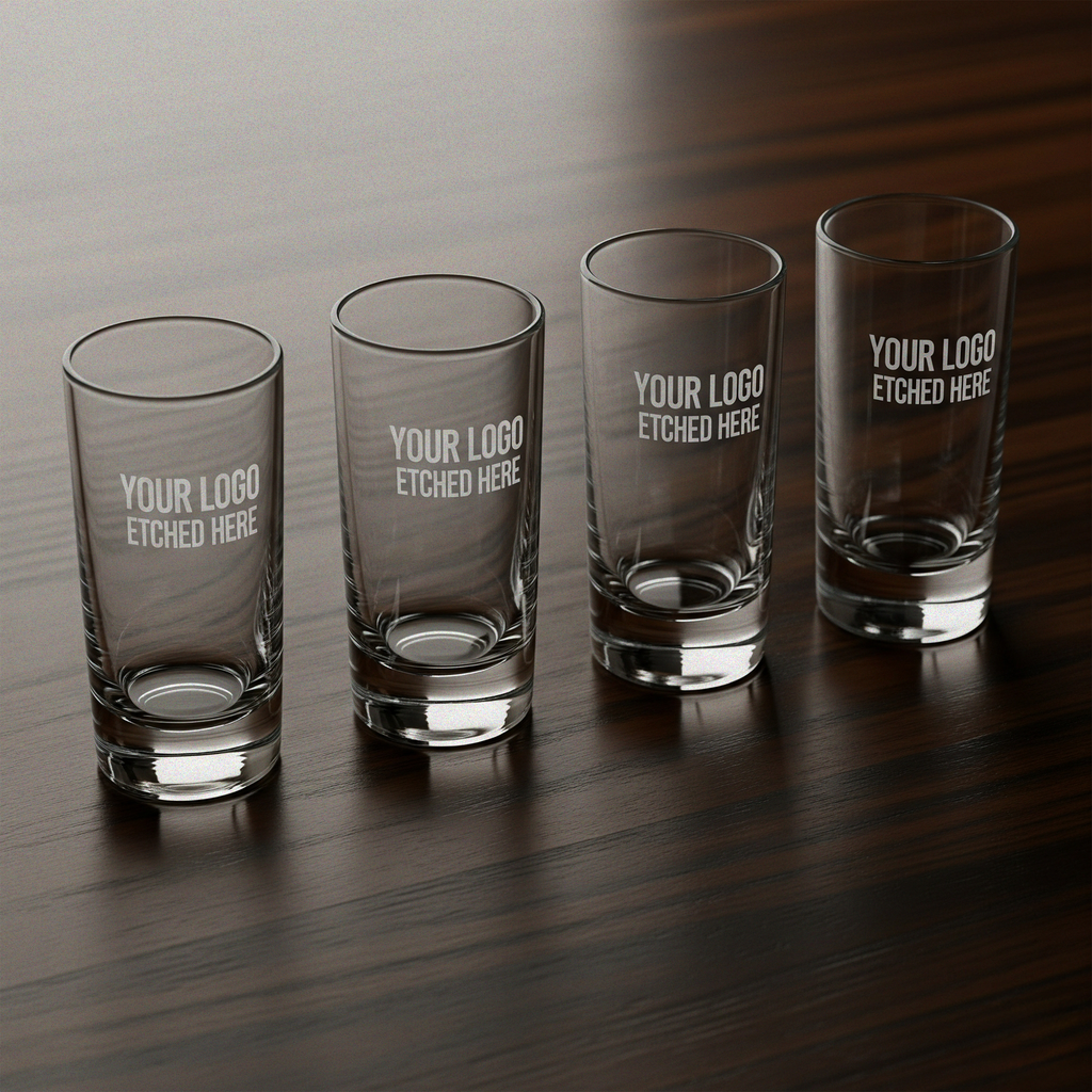 Four clear glasses with 'Your Logo Etched Here' text on a wooden surface